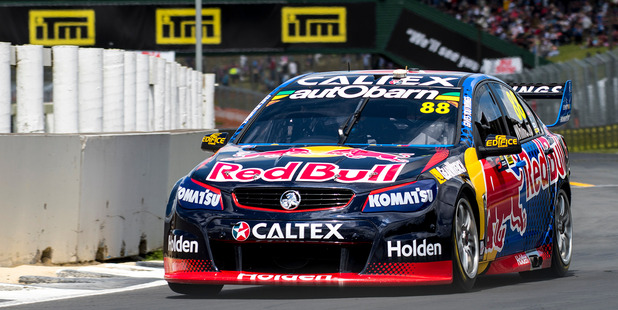 Jamie Whincup on the way to the lap record. Photo / Matthew Hansen