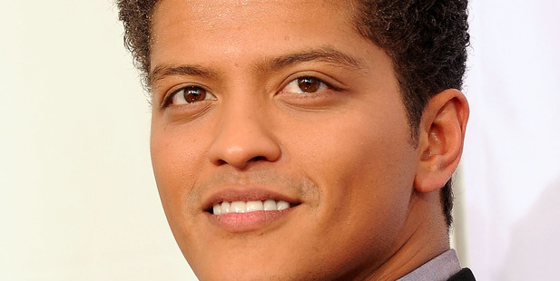 Musician Bruno Mars, winner of Favorite Pop/Rock Male Artist Award, poses in the press room at the 2011 American Music Awards. Photo / Getty