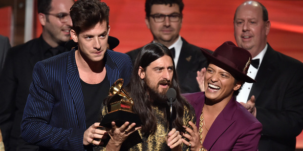 (L-R) Producers Mark Ronson, Jeff Bhasker, and recording artist Bruno Mars accept the Record Of The Year award for 'Uptown Funk' onstage during The 58th GRAMMY Awards. Photo / Getty