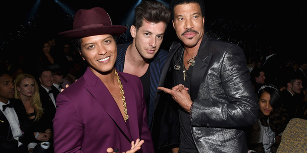 (L-R) Singer Bruno Mars, musician Mark Ronson and singer Lionel Richie attend The 58th GRAMMY Awards at Staples Center on February 15, 2016 in Los Angeles, California. Photo / Getty