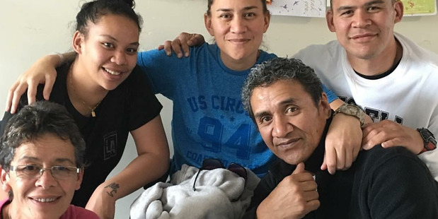 Vicki Letele with her parents (front) Tui and David, her partner Leah, and brother Dave. Photo / Supplied