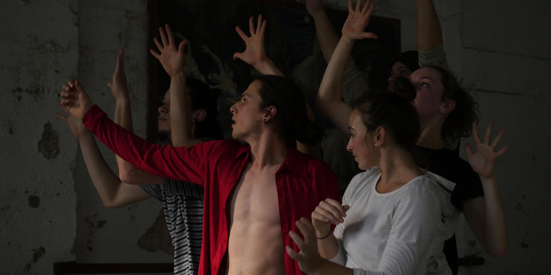 Dancer Jeremy Beck, in a scene from Lifeworld (in five parts) contemplates how the colour of a shirt may impact on the mood of his day. Photo: Lucy Marinkovich.