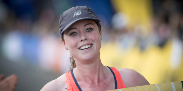 Nicole Goldsmid celebrates winning the female marathon. Photo / Greg Bowker