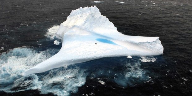 A sea filled lake sits on this iceberg off the Otago coast. Photo / Stephen Jacquiery