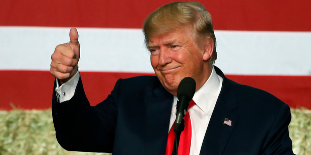 A national tracking poll released yesterday showed Donald Trump already gaining ground, even before the latest twist on the Hillary Clinton emails. Photo / AP