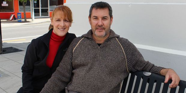 Megan and Stephen Nicholls of Brisbane on the Miss Joan Irvine memorial seat on Gordon St. Stephen is a former pupil of Miss Irvine and went on to become principal dancer with the Royal New Zealand Ballet Company from 1980 to 1988. Photo / Christine McKay