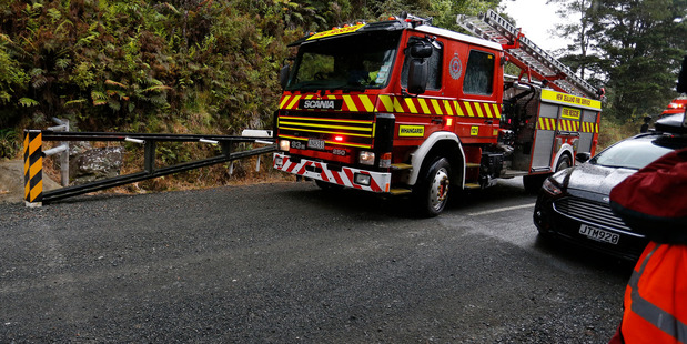 Emergency services head to the scene of a helicopter crash in the Glenbervie Forest. PHOTO/ Jphn Stone