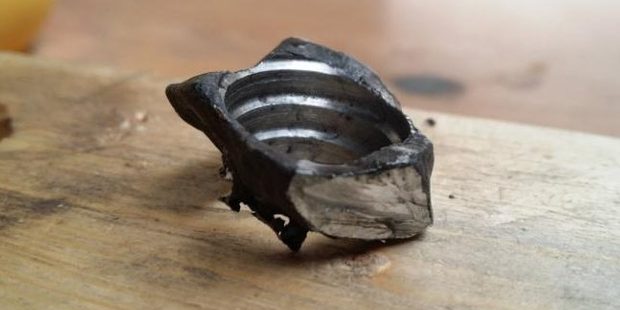 He ground off the jagged edges until it was in the shape of a ring. Photo / Chadmanx Imgur
