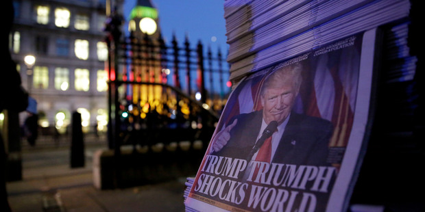 Copies of the London Evening Standard report on President-elect Donald Trump winning the American election. Photo / AP