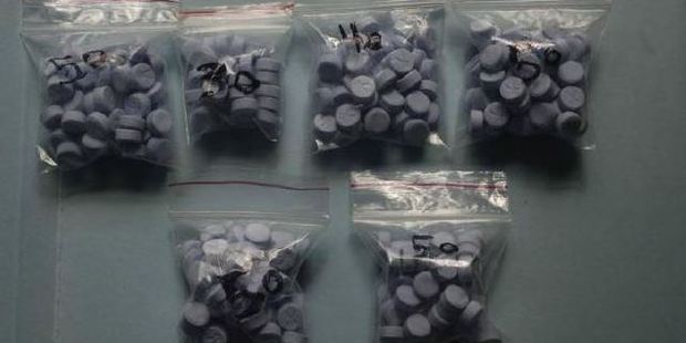 Blue scissor NDOMe pills. Photo / Supplied