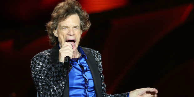 Mick Jagger sings as The Rolling Stones perform live at Mt Smart Stadium on November 22, 2014 in Auckland, New Zealand. Photo / Getty