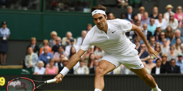 Roger Federer playing at Wimbledon. Photo / Getty Images