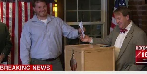 It all started so well in Dixville Notch, where a smiling voter waited to cast his ballot, the first on election day. Photo / CNN