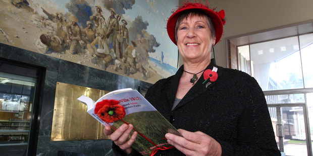 REMEMBERING: Dominique Cooreman, author of the book, La Basse Ville 1917: New Zealand Voices from Flanders Fields, is paying her respects this Armistice Day, as she does every year. PHOTO/DUNCAN BROWN