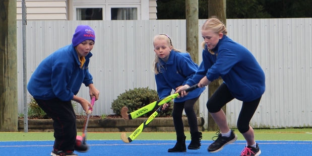 Isaac Hancock, Georgia Payne and Ashlyn Crawford try out new skills.