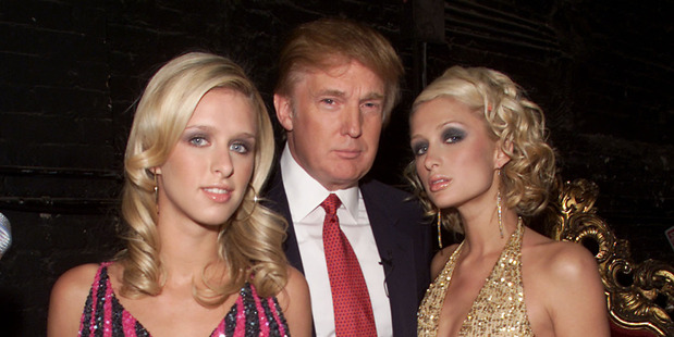 Donald Trump with Paris and Nicky Hilton in 2001. Photo / Getty Images.