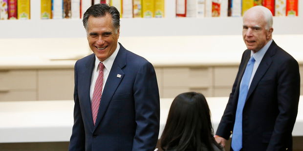 Romney, left, blasted Trump pre-election. Photo / AP