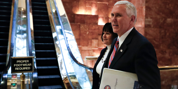 Vice President-elect Mike Pence and his wife Karen arrives at Trump Tower. Photo / AP
