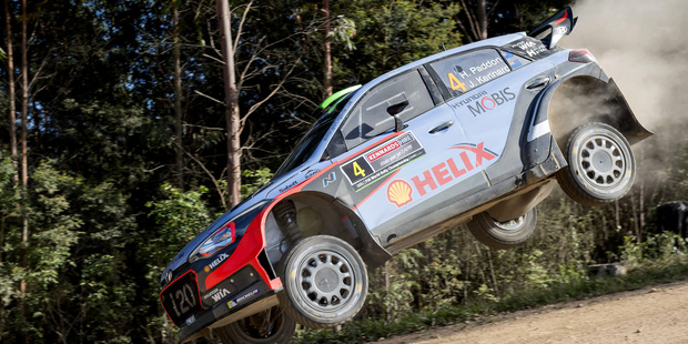 Hyundai motorsport's Hayden Paddon of New Zealand is airborne during a Rally Australia time trial. Photo / AP