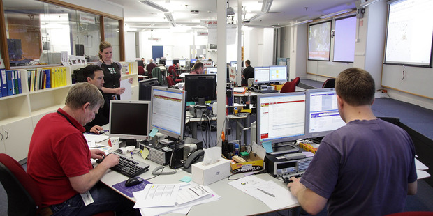 Staff work their posts at the National Crisis Management Centre in the Beehive bunker in Wellington, New Zealand. Photo/file