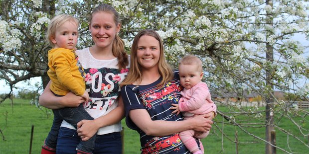 Au pair Veronika Burger with Callum and mum Rachel Perks with Matilda, grateful for another pair of hands.