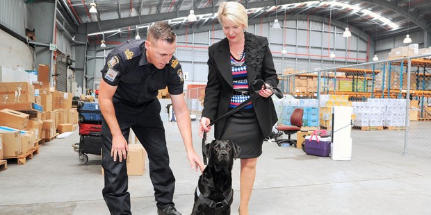 Senior Customs Officer Paul Ferguson, Que and Customs Minister Nicky Wagner.
