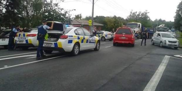 Police were at the scene on Don Buck Rd, a witness said. Photo / Kristy Thompson