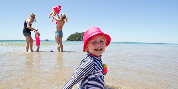 Lucy Evemy, 4, at Mount Maunganui Beach with mum Courtney Evemy and Olive, 1, and Rebecca Thomson and Ruby Rankin, 1. Photo/Ruth Keber