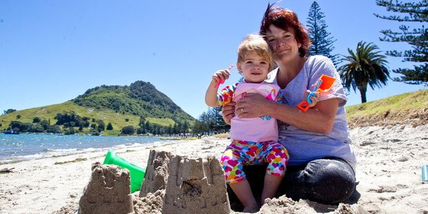 Pam Tapp with her granddaughter Maddi Allan-Tapp, 20 months, at Pilot Bay enjoying the hot weather. Photo/Ruth Keber