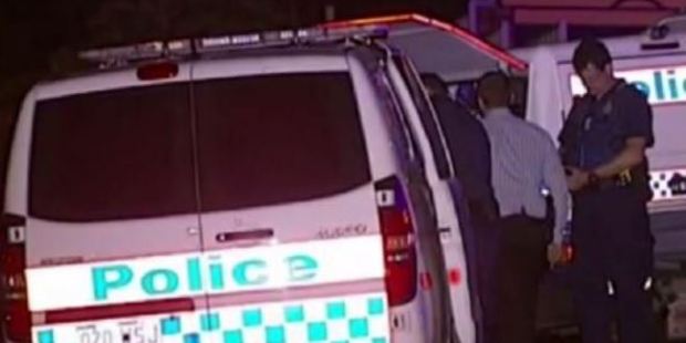 Police at the double stabbing at Alexandra Hills, Brisbane. Photo / Channel 9