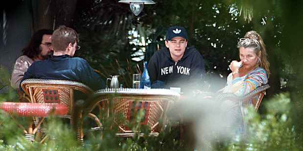  Leonardo Dicaprio Having Lunch With His Step-Brother, Adam, Father, George (Left) And Mother, Irmelin in 1999. Photo / Getty 