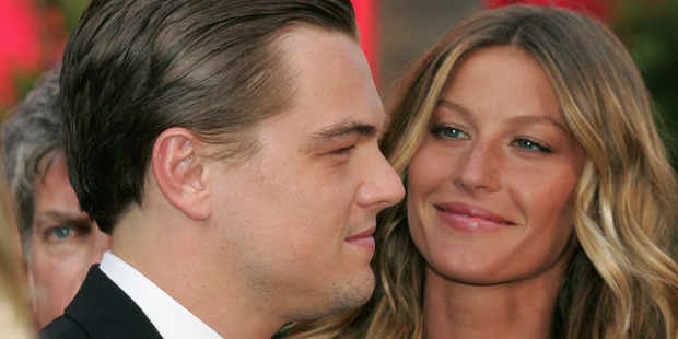 Actor Leonardo DiCaprio and Gisele Bundchen arrives at the 77th Annual Academy Awards. Photo / Getty 
