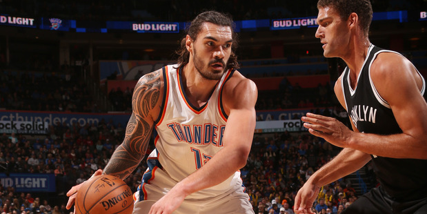 Steven Adams handles the ball against the Brooklyn Nets. Photo / Getty Images