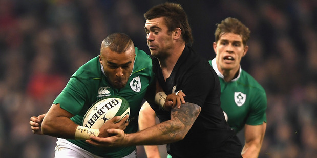 Liam Squire makes a tackle on Ireland's Simon Zebo during the All Blacks' 21-9 victory in Dublin this morning (NZT). Photo / Getty Images