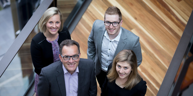 ASB's Kevin McDonald (front) with members of the Gen Y leadership team (LtoR); Gemma Macaulay, Michael Evans and Alice Selby. Photo / Dean Purcell