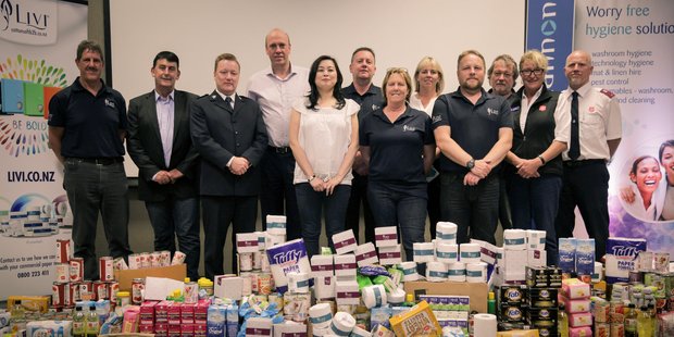 DONATION: The OCS team made a massive donation towards Rotorua Salvation Army's Foodbank. PHOTO/SUPPLIED