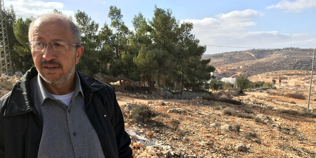 Issa Zayed is among the Palestinians whose families proved to the Israeli high court that they owned the property where Amona is built. Photo / Washington Post