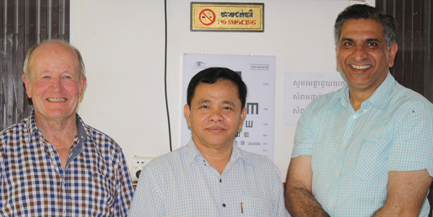 Retired Whanganui optometrist Mike Webber (left) with Phnom Penh eye clinic director Dr Hang Vra, and Timaru ophthalmologist Dr Muhammad Khalid. Photo/Supplied.