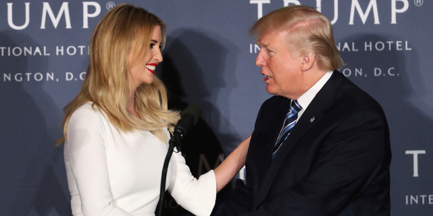 Donald Trump greets his daughter Ivanka Trump during the grand opening of Trump International Hotel in Washington. Photo / AP