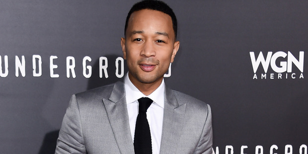 John Legend said he was 'concerned' about Kanye West's health before his hospitalization. Photo / AP