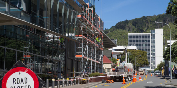 Scaffolding is erected around the exterior of the GCSB and SIS building in Wellington which was damaged during the November 14 Kaikoura earthquake. Photo / Mark Mitchell