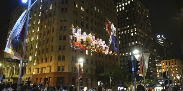 Images are projected onto the Lindt Cafe during the one year service of the Lindt Cafe Siege in Dec 2015. Photo / Getty Images