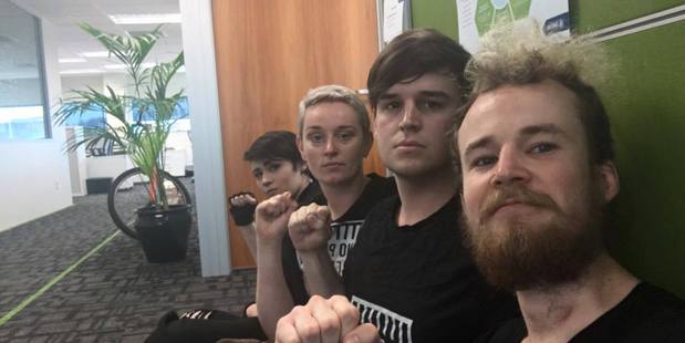 Protestors inside the Hamilton Department of Corrections office this morning. Photo / Supplied