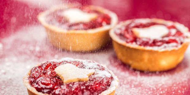 Mince pies date back to medieval times and were originally filled with a mixture of meat, dried fruit and spices. Photo / 123RF