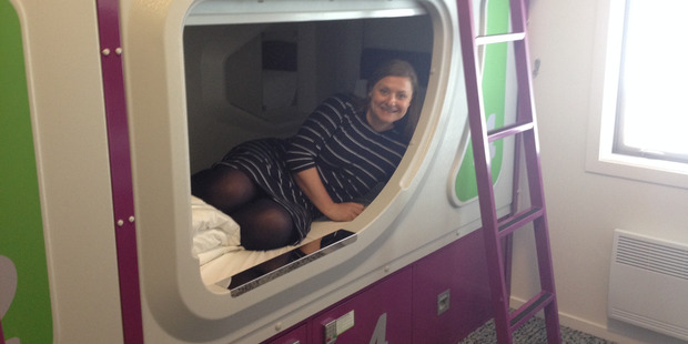 Deputy Travel Editor Stephanie Holmes tries out the pods.