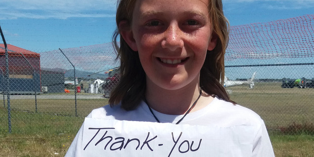 Stevie Dineen says thank you to Penny Rusbatch for her surprise birthday chopper ride with Richie McCaw. Picture / supplied