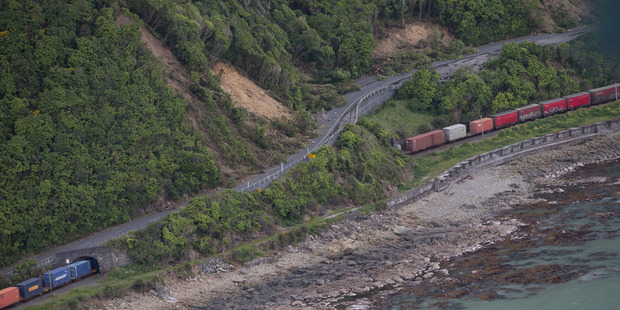A freight train sitting where it came to a halt beside Highway One north of Kaikoura. Photo / Mark Mitchell.