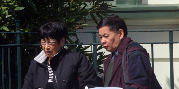 Ena Lai Dung, 64, left, and husband Hok Lai Dung, 73, leave Masterton District Court after being convicted of five charges each of obtaining a class B drug, pethidine. Photo / file