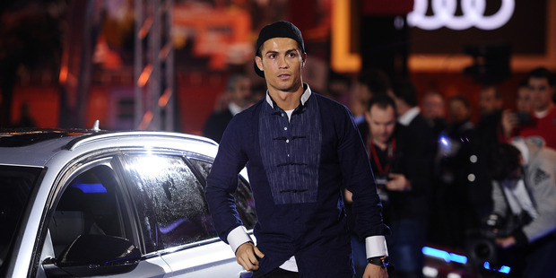 Cristiano Ronaldo of Real Madrid gets into his Audi RS Quattro car for the 2016/2017 season at Carlos Sainz Center. Photo / Getty Images