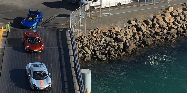 The luxury cars board the Kaitake ferry this morning. Photo / @GeorgeKCampbell Twitter